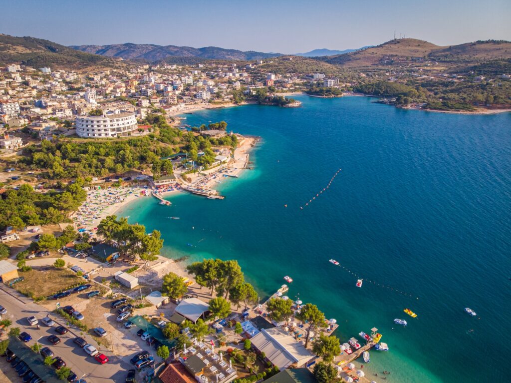 Aerial view of the coastline of the resort town of Ksamil on a sunny summer day. Albania.