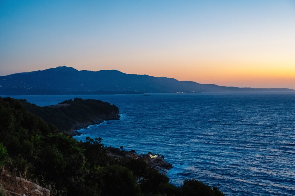 Albania riviera. Beach on coast of Ionian Sea in Albania, Ksamil, near Greece island Korfu. Shpella e Pëllumbave beach